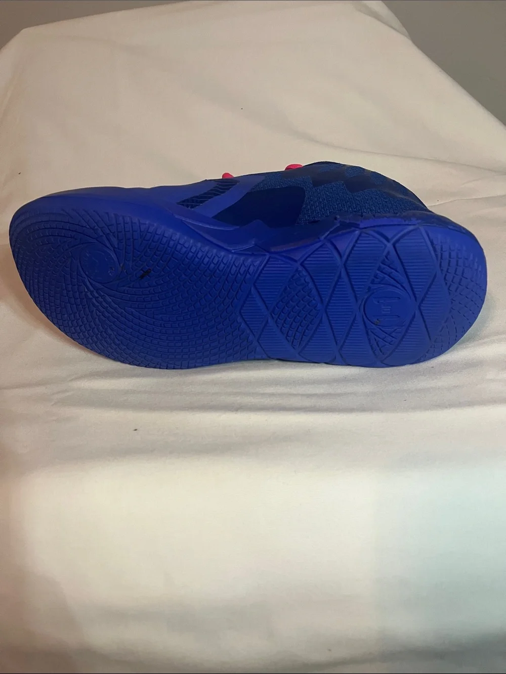 Puma mens Melo Athletic Shoes in Blue with Pink Laces